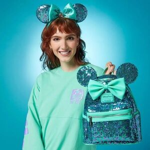Loungefly Disney Parks purple and teal Minnie bag